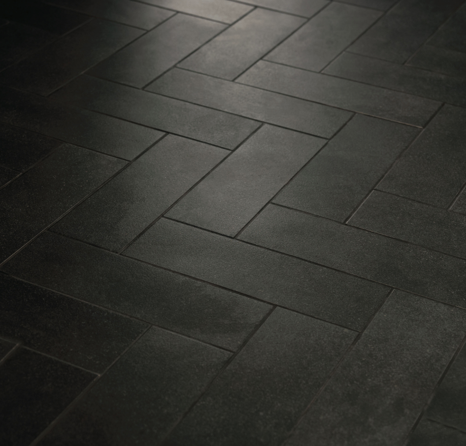 black slate tiles in a tessellated pattern